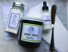 Sugaring Kit from The Earthly Alternative featuring natural hair removal wax, applicators, and instructions for DIY waxing at home.