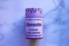 The Earthly Alternative Pit Perfume Deodorant in amber bergamot scent, natural deodorant stick with botanical ingredients.