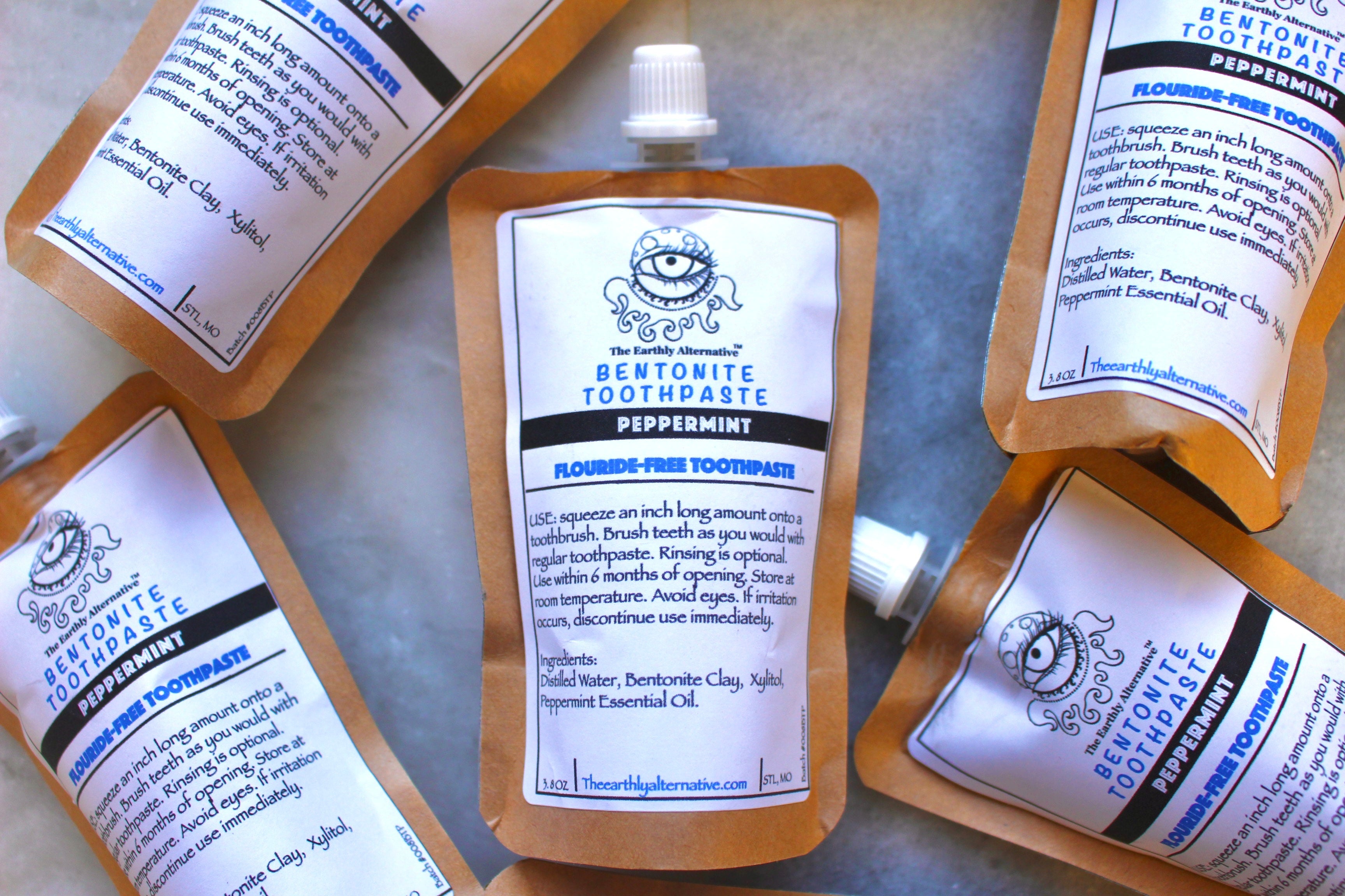 Bentonite clay toothpaste by The Earthly Alternative showing a tube of natural toothpaste with clay ingredients.