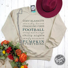 Autumn Words Cozy Sand Crewneck Sweatshirt by The Graphic Tee, featuring a soft sand color and autumn-themed graphic design.