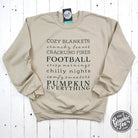 Autumn Words Cozy Sand Crewneck Sweatshirt by The Graphic Tee, featuring a soft sand-colored fabric and autumn-themed graphic design.