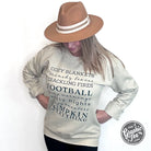 Autumn Words Cozy Sand Crewneck Sweatshirt by The Graphic Tee, featuring a soft sand color and autumn-themed graphic design.