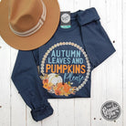 Vintage navy long sleeve tee by The Graphic Tee featuring autumn leaves and pumpkins graphic print.