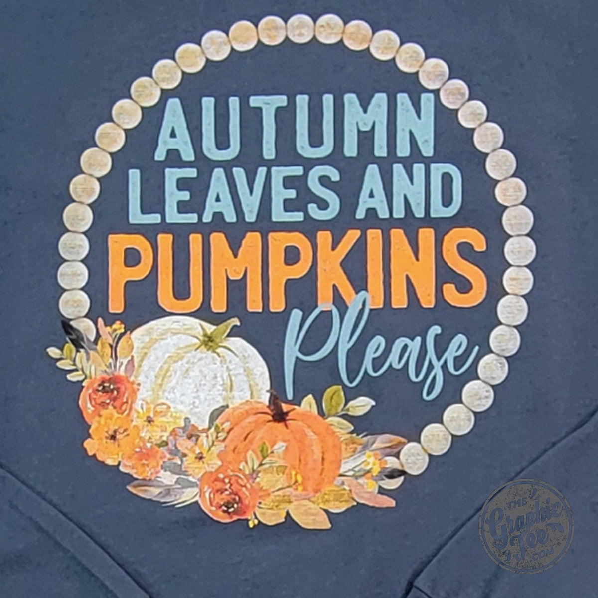 Vintage navy long sleeve tee by The Graphic Tee featuring autumn leaves and pumpkins graphic design.
