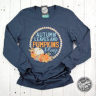 Vintage navy long sleeve tee with autumn leaves and pumpkins graphic, featuring seasonal fall design by The Graphic Tee.
