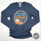 Vintage navy long sleeve tee featuring autumn leaves and pumpkins graphic from The Graphic Tee, casual fall-themed apparel.