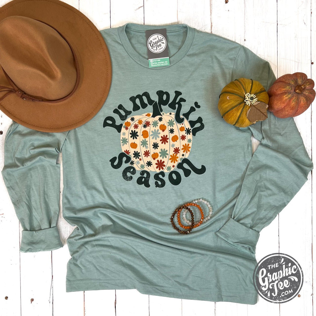 The Graphic Tee pumpkin season long sleeve graphic T-shirt in XS with a fall-inspired pumpkin design.