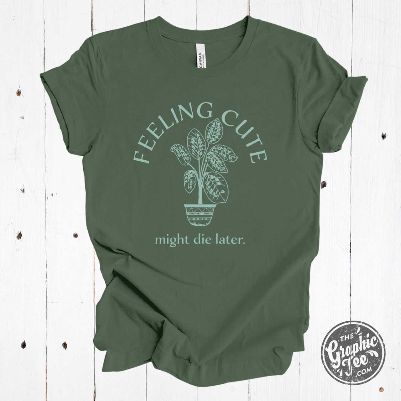 Black short sleeve graphic tee by The Graphic Tee with the slogan "Feeling Cute Might Die Later" printed on the front.