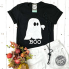 The Graphic Tee Boo Ghost short sleeve graphic t-shirt featuring a spooky ghost design on white fabric.