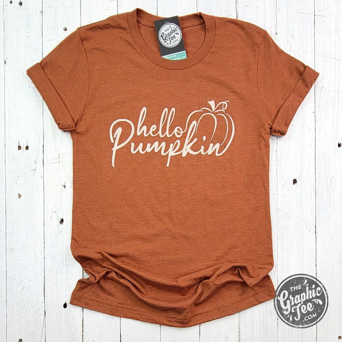 Hello Pumpkin short sleeve graphic tee by The Graphic Tee featuring a festive seasonal design on a casual T-shirt.