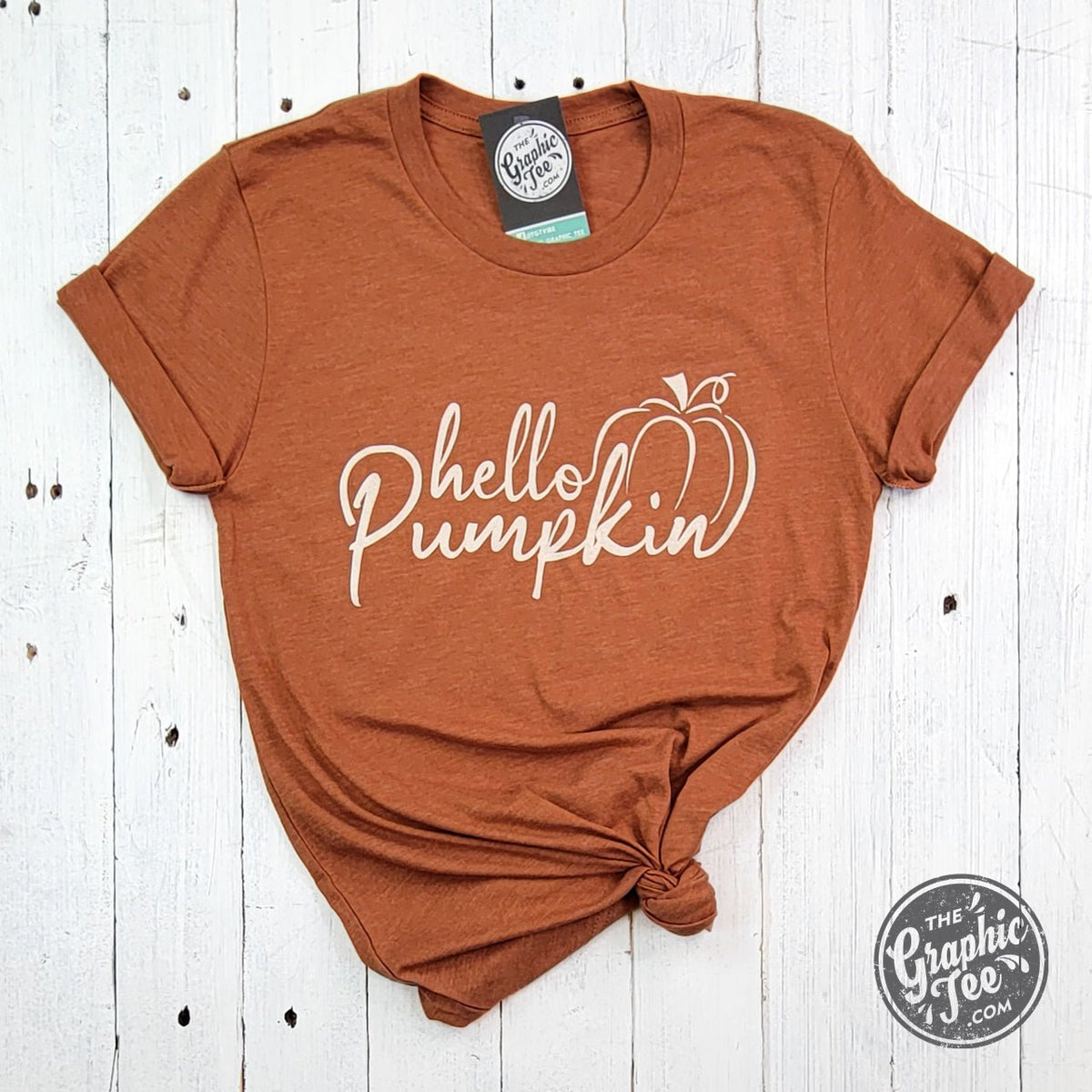 Hello Pumpkin short sleeve graphic tee by The Graphic Tee, featuring a festive pumpkin design on soft cotton fabric.