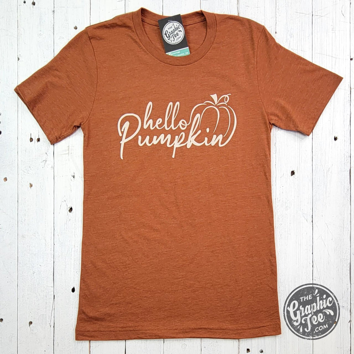 Hello Pumpkin short sleeve graphic tee by The Graphic Tee, featuring a festive pumpkin design on a casual cotton shirt.