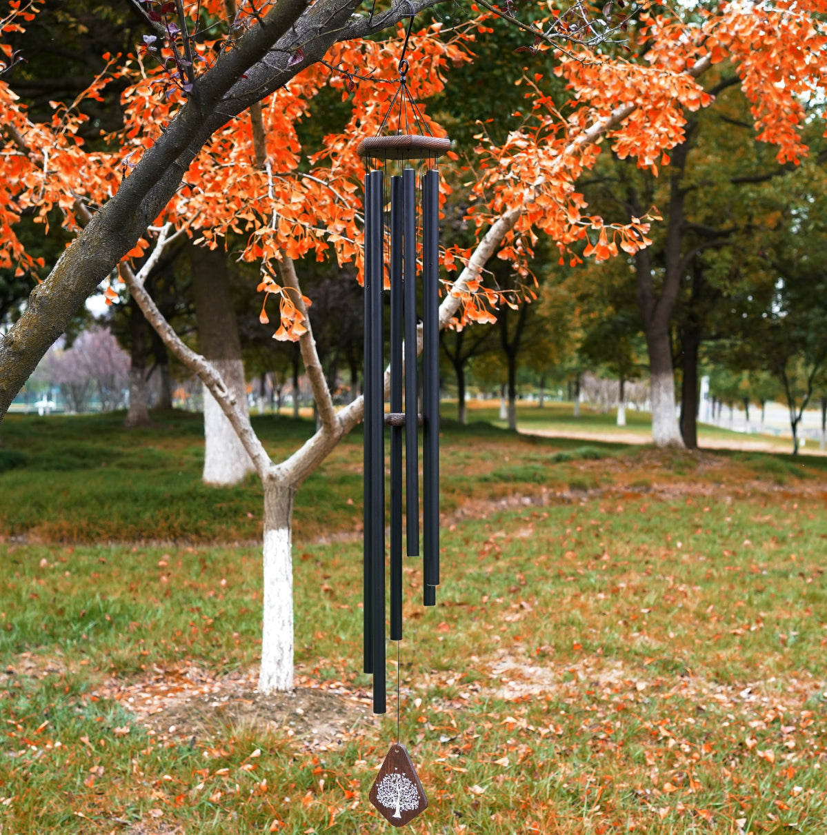 Large deep tone wind chime by The Wind Chime Co featuring church bells, perfect for memorials or reflective moments, 55 inches tall.