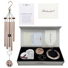 Memorial wind chime from Whispering Hearts collection featuring platinum rose design, personalized, 30-inch wind chime by The Wind Chime Co.