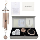 Memorial wind chime from Whispering Hearts™ collection featuring platinum rose design and personalized engraving, 30 inches tall.