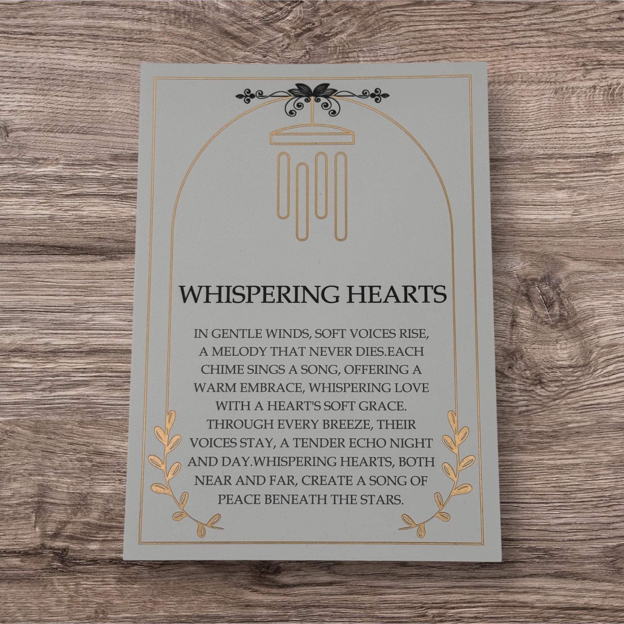 Rose gold memorial wind chimes from The Wind Chime Co's Whispering Hearts collection, featuring a memorial heart, 28-inch length.