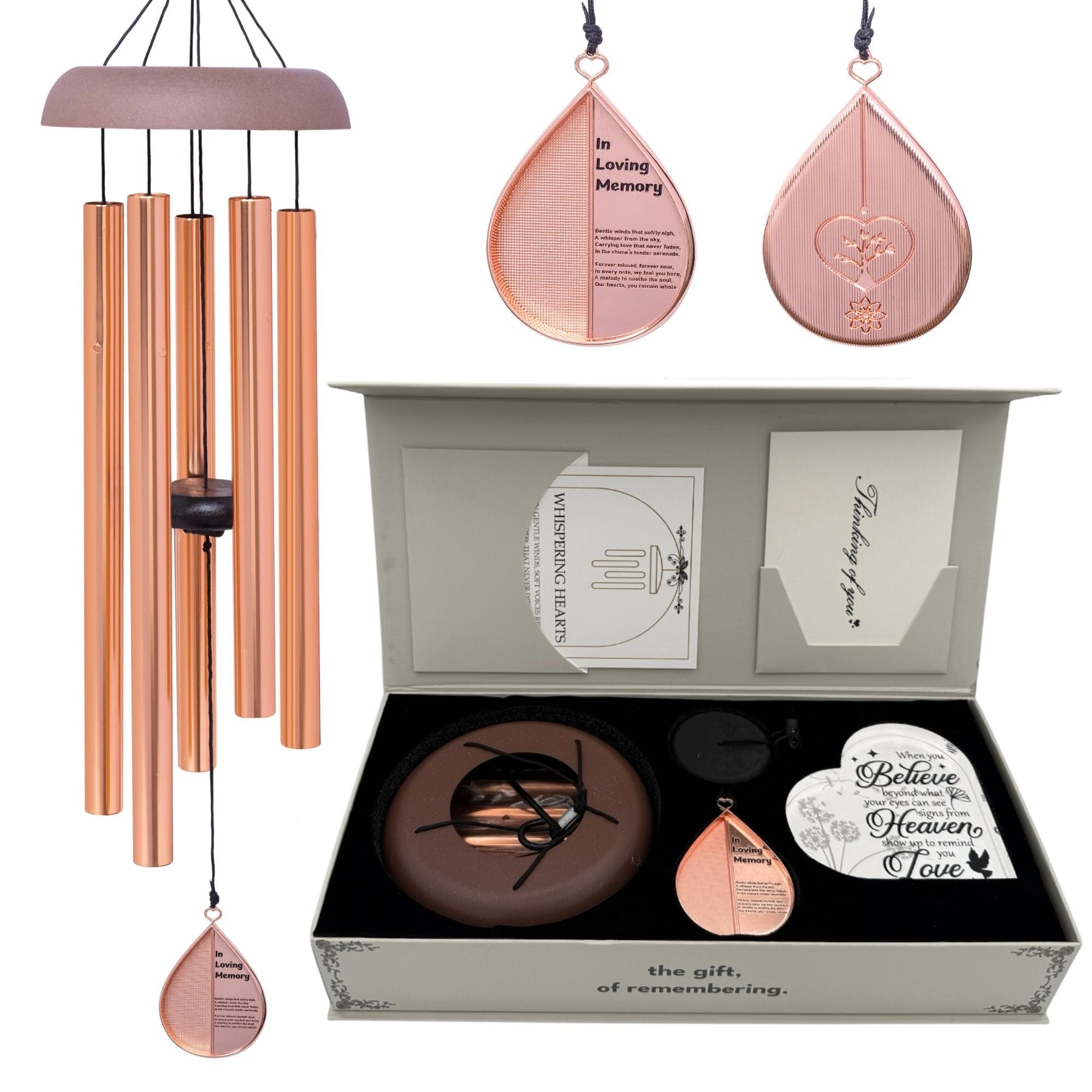 Memorial wind chimes from The Wind Chime Co's Whispering Hearts collection with rose gold finish and a memorial heart, 28 inches long.