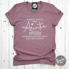 They Call Me Auntie short sleeve graphic tee by The Graphic Tee, featuring a casual, stylish design on a white fabric background.