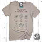 Gray short sleeve graphic tee by The Graphic Tee featuring humorous "Things I Do In My Spare Time" text on the front.
