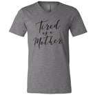 Black Tired as a Mother graphic T-shirt by The Graphic Tee, featuring a casual design with bold text on a soft fabric tee.