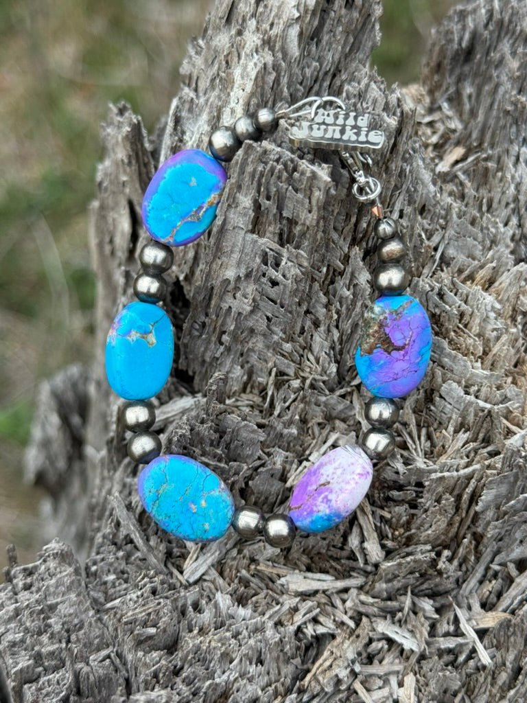 Turquoise Twilight oval beaded bracelet by Wild Junkie featuring round and oval turquoise beads and silver accents.