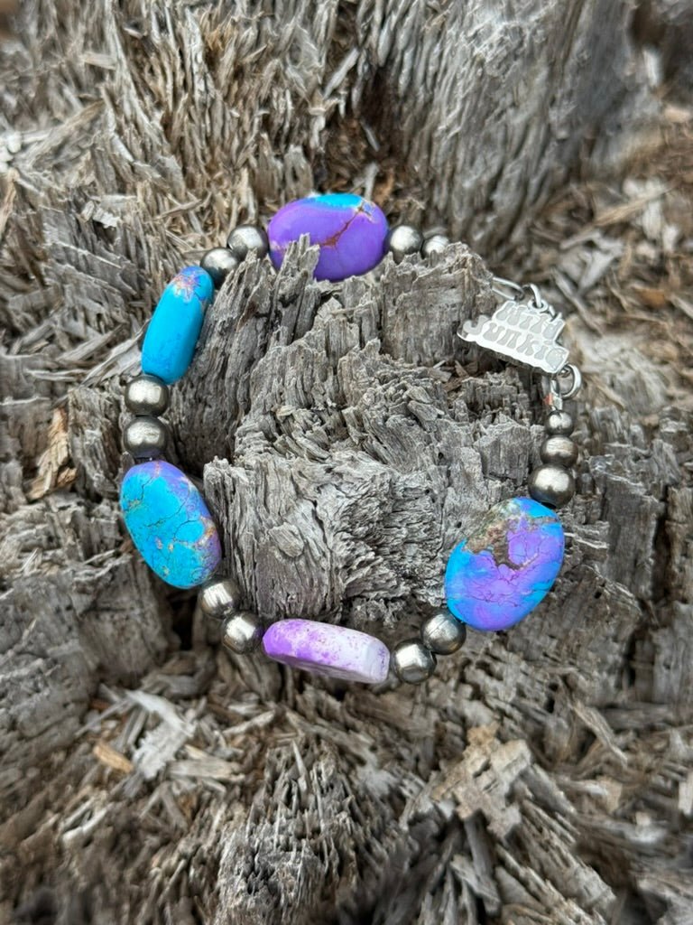 Turquoise Twilight Oval Beaded Bracelet by Wild Junkie featuring turquoise beads and oval-shaped design for stylish wear.