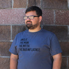 Gray unisex short sleeve graphic tee from The Graphic Tee featuring the text "Uncle. The Man. The Myth. The Bad Influence."