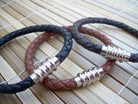 Men's black leather bracelet with stainless steel magnetic clasp, braided design, fits a 6.75-inch wrist, by Urban Survival Gear USA.