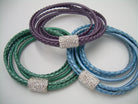 Women's rhinestone and leather wrap bracelet with stainless steel magnetic clasp, featuring metallic pearl accents and fits a 6-inch wrist.