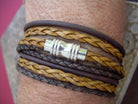 Leather men's and women's wrap bracelet with stainless steel magnetic clasp, featuring rugged style and adjustable fit.