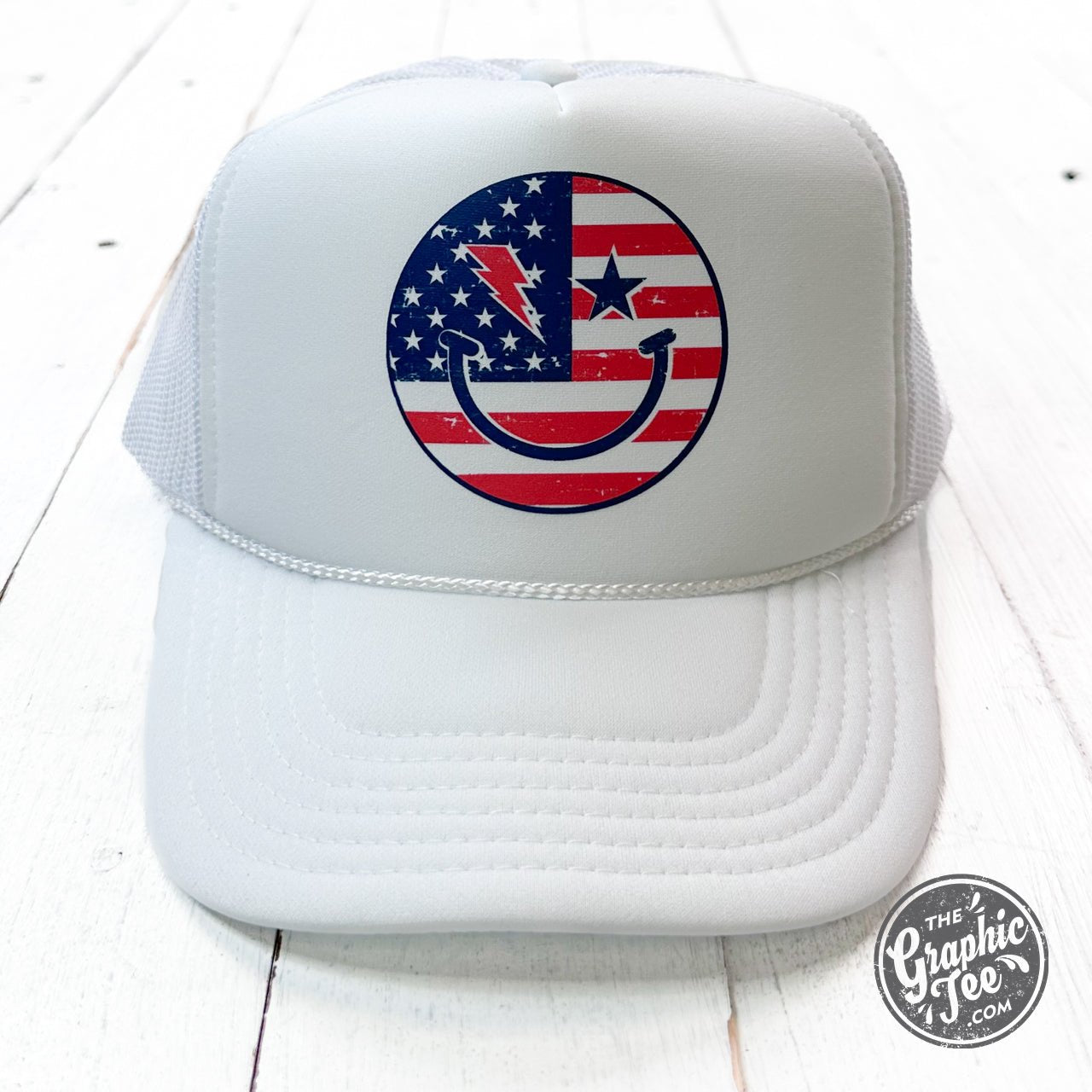 USA Smiley Foam Trucker Cap by The Graphic Tee featuring a colorful smiley face design on a classic trucker hat