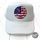 USA Smiley Foam Trucker Cap by The Graphic Tee featuring a colorful smiley face design on a classic trucker hat