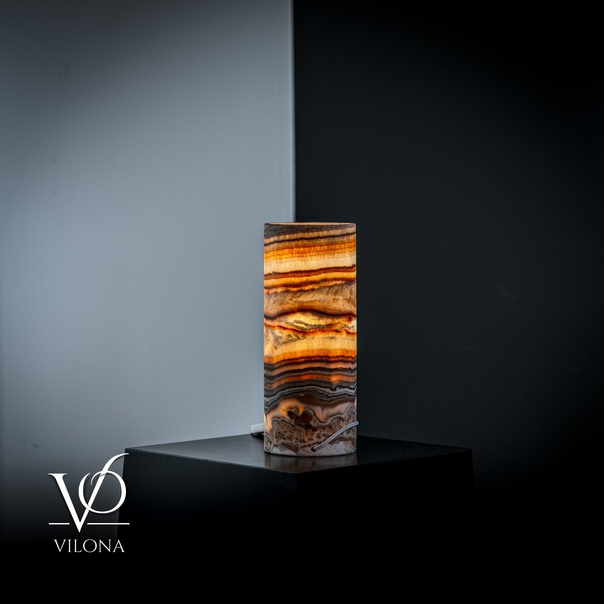 Vilona Onyx Sahara Onyx Desk Lamp, cylinder-shaped table lamp with a sleek black and natural stone finish, perfect for modern décor.