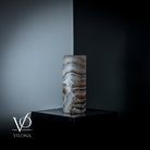 Vilona Onyx Sahara Onyx desk lamp with cylindrical shape, featuring a sleek black and gold design for modern lighting.