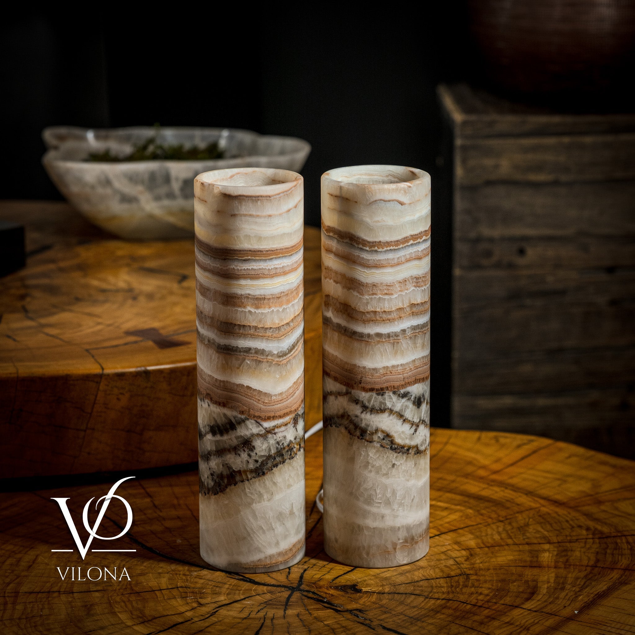 Pair of Vilona Onyx Sahara Onyx desk lamps, cylinder table lamps with sleek black and natural stone finish.