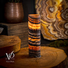 Vilona Onyx Tangerine Crystal desk lamp with a vibrant orange and black onyx base, modern design, and adjustable lighting.
