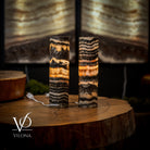 Pair of Vilona Onyx Tangerine Crystal desk lamps featuring vibrant orange crystal accents and sleek black bases.