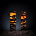 Pair of Vilona Onyx Tangerine Crystal desk lamps with vibrant orange onyx bases and elegant crystal accents.