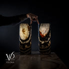 Pair of Vilona Onyx Tangerine Crystal desk lamps with onyx bases and vibrant crystal accents, designed for elegant table lighting.