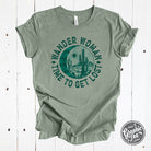 Heather sage short sleeve graphic tee featuring Wander Woman "Time To Get Lost" design from The Graphic Tee.