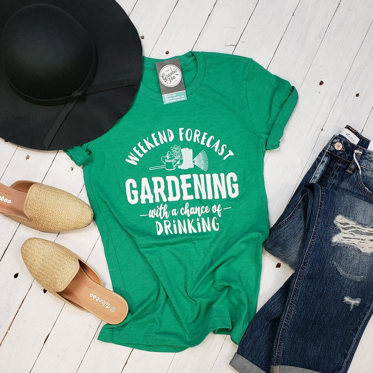 Short-sleeve graphic tee from The Graphic Tee featuring a weekend forecast with gardening and drinking illustrations.
