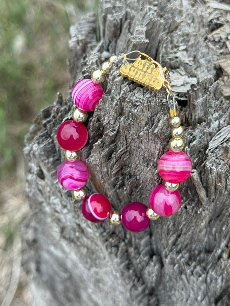 Gold Wild Rose Agate beaded bracelet by Wild Junkie featuring round polished agate beads and gold accents.