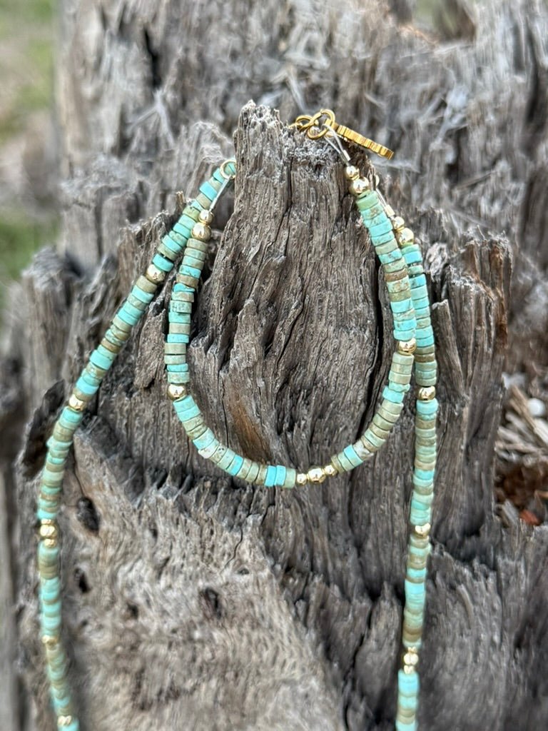 Golden turquoise trail heishi beaded bracelet by Wild Junkie featuring small round beads on a stretchy cord.