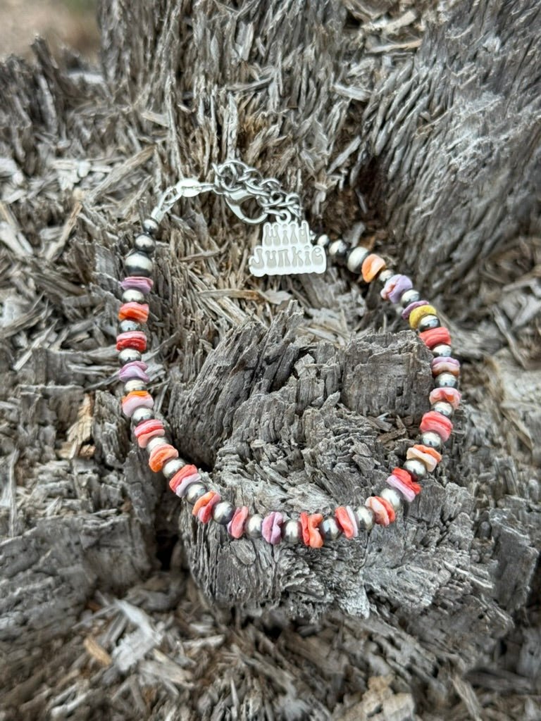 Sterling silver Desert Sunset shell heishi bead bracelet by Wild Junkie featuring natural beach-inspired design.