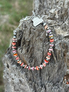 Sterling silver Desert Sunset Shell Heishi Bead Bracelet by Wild Junkie featuring colorful shell beads and silver accents.