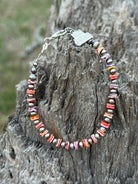 Sterling silver Desert Sunset Shell Heishi Bead bracelet by Wild Junkie with layered shell and silver beads.