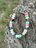 Sterling silver bracelet with pastel opal beads from Wild Junkie, featuring a delicate beaded design and polished silver accents.