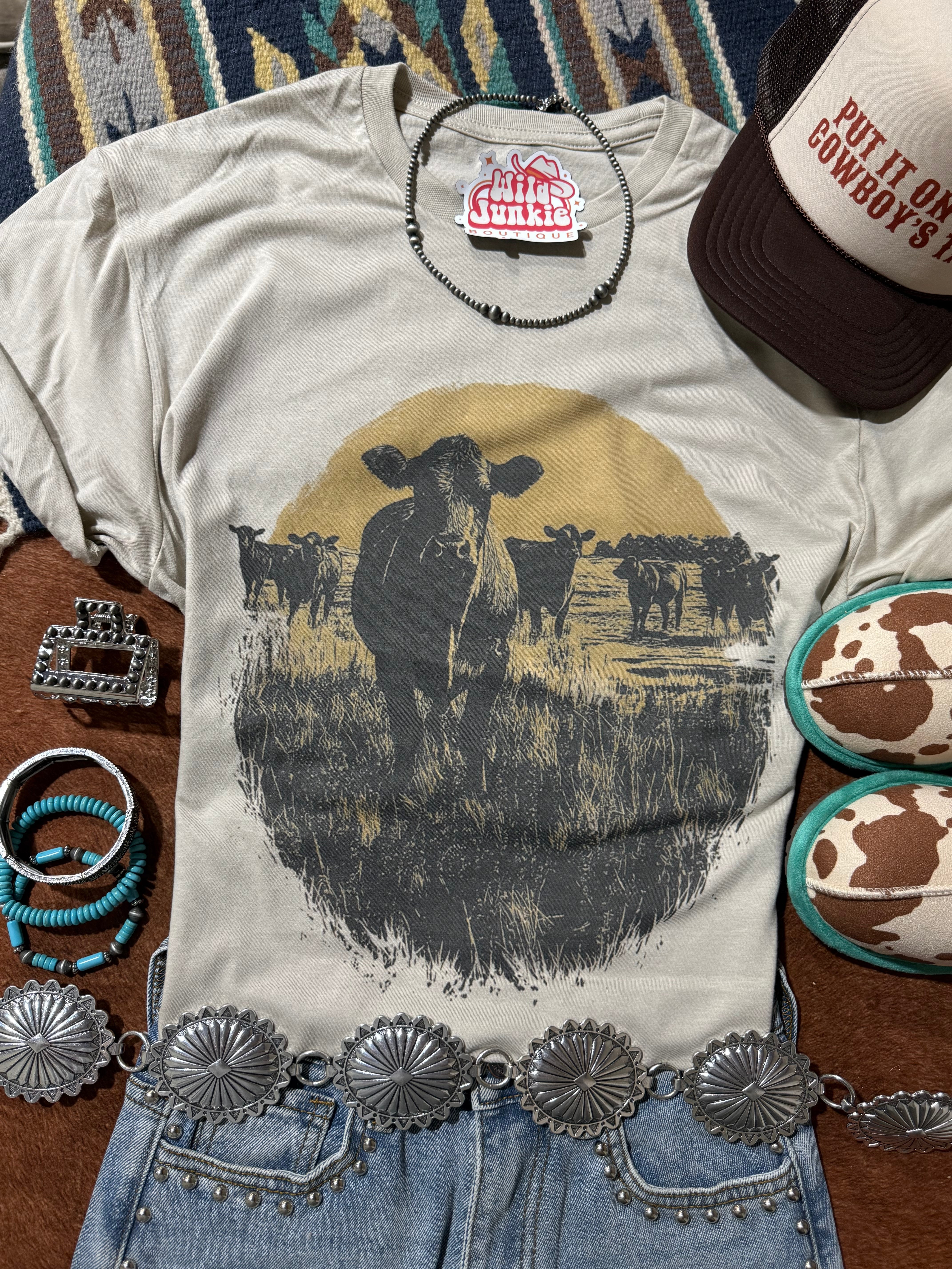 Wild Junkie Pasture Sunset Graphic Tee featuring a vibrant sunset landscape and casual fit, perfect for outdoor-inspired style.