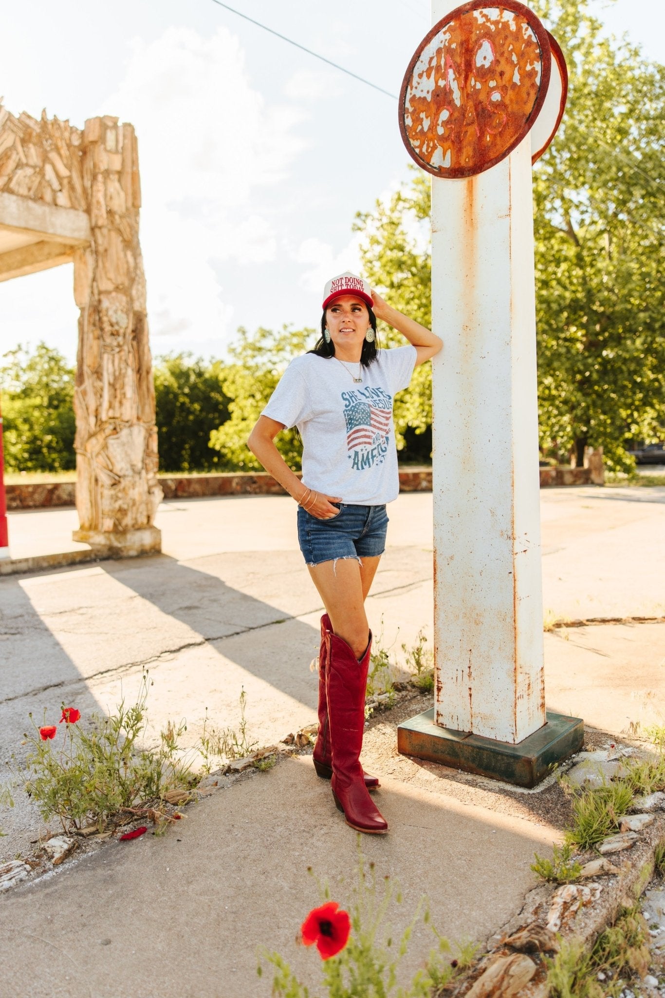 Wild Junkie She Loves Jesus & America graphic tee showing patriotic and faith-inspired design on a casual T-shirt.
