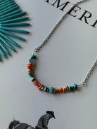 Authentic Spiny Oyster Chip Bead Necklace by Wild Junkie featuring colorful natural stone beads on a string.